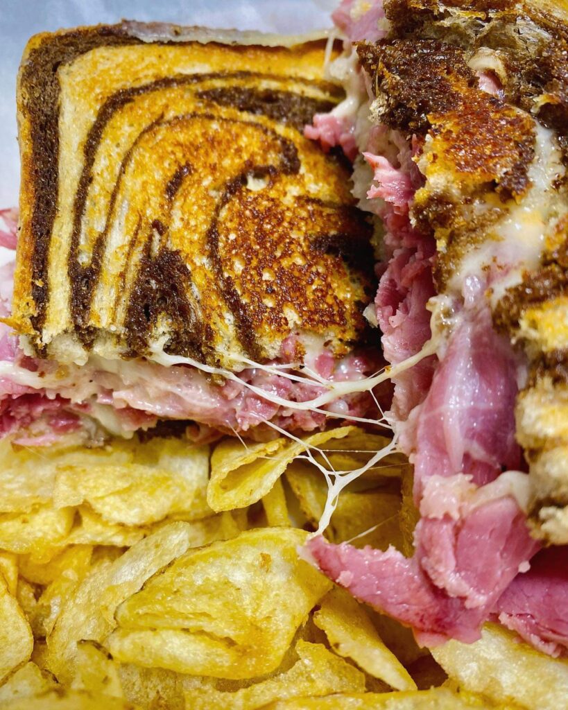 A popular choice today – the cheesiest corned beef reuben around! Squished betwe